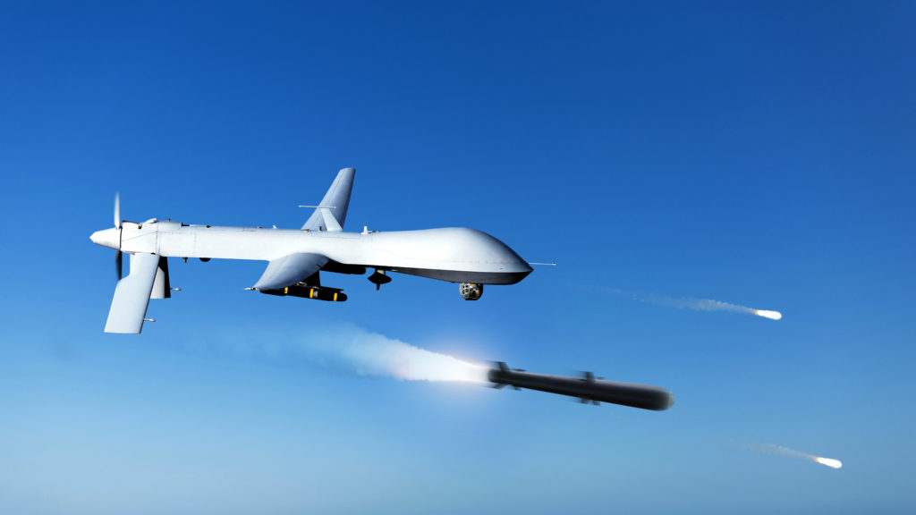 A combat drone shoots missiles.
