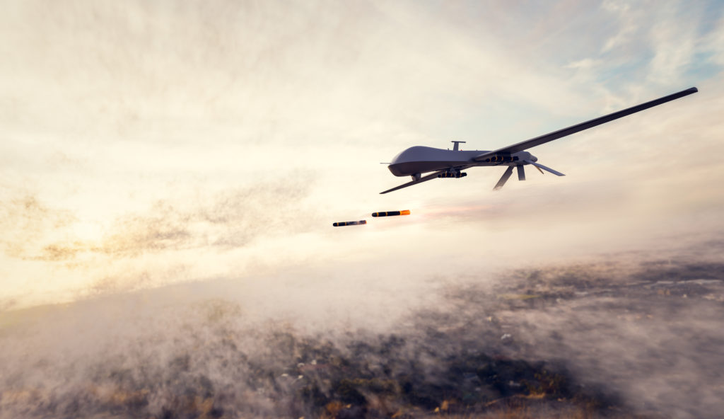 A military combat drone launches missilies.