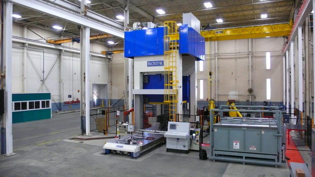 Hydrauloc press by Macrodyne.