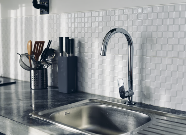 Deep-drawn stainless steel kitchen sink used as an example of a complex forming application.